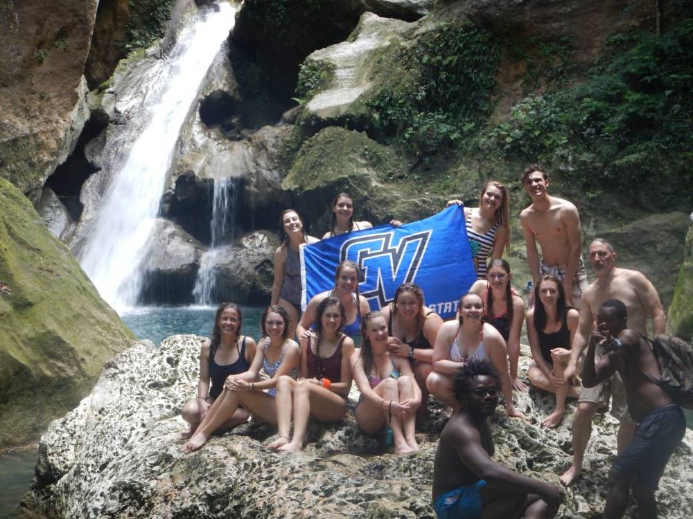 Group photo in front of Bassin Bleu waterfall near Jacmel, Haiti